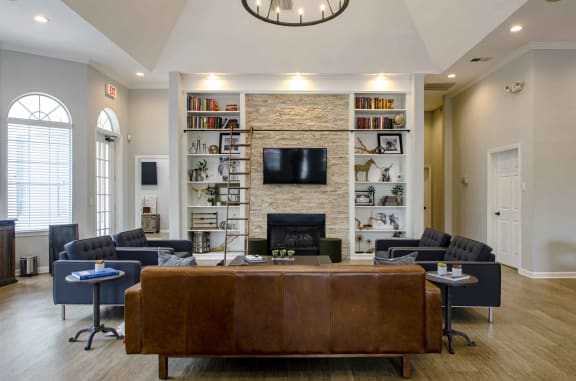 Club Room With Large Screen Tvs And A Fireplace, at Wyndchase at Bellevue Apartments, Nashville, TN 37221