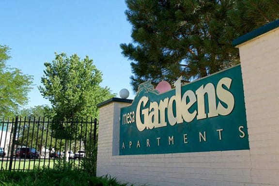 welcome sign for Mesa Gardens Apartments