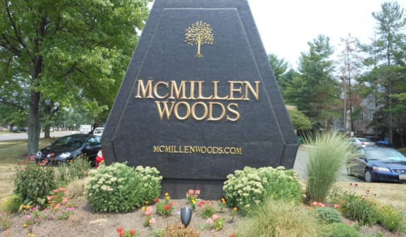 welcome sign at McMillen Woods Apartments