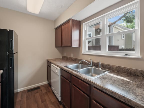 apartment kitchen with double bowl sink