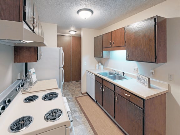 kitchen with dishwasher at pointe west apartments
