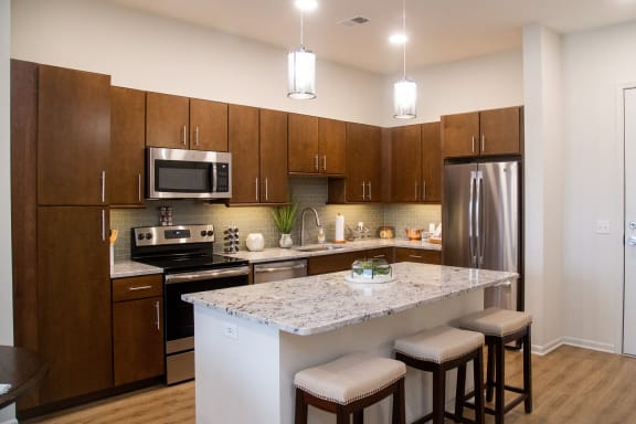 Gourmet Kitchen With Island at The Residences at Park Place, Leawood, KS