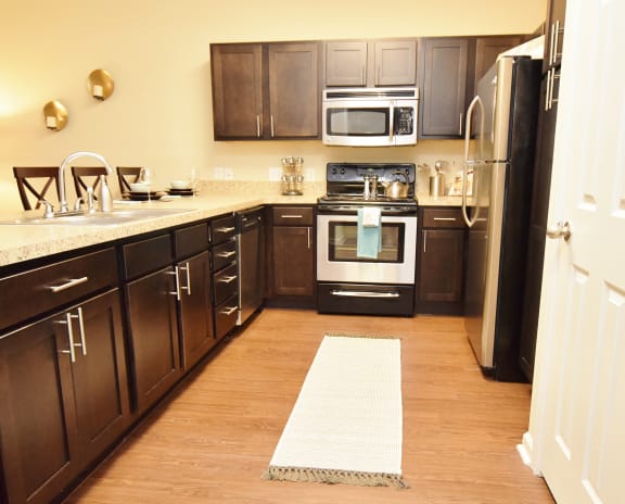 Kitchen at Highlands of Grand Pointe Apartments in Lafayette, LA