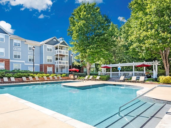 Sparkling pool with sundeck  at The Village Apartments, Raleigh, 27615