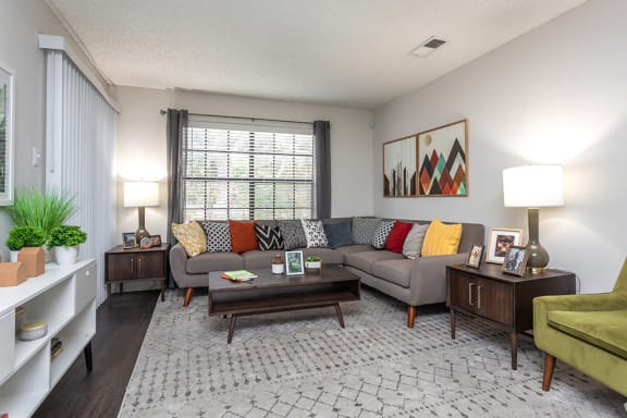 Living Room With Expansive Window at Peppermill Apartments, CLEAR Property Management,Texas, 78148