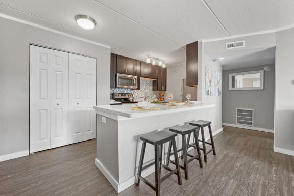 Renovated Kitchen with white interior at Woodland Ridge Apartments in Woodridge, IL