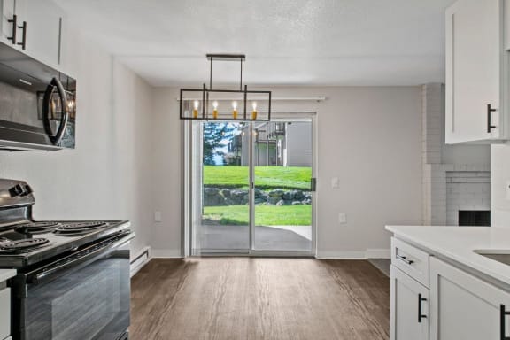 Ridgetop Apartments Kitchen and Dining Area with Private Patio