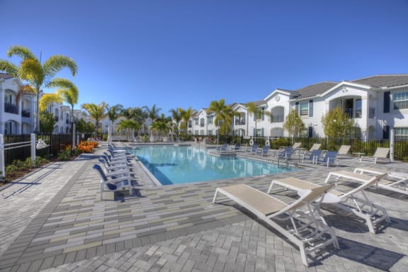 Pool Side Relaxing Area With Sundeck at The Crest at Naples, Florida, 34113