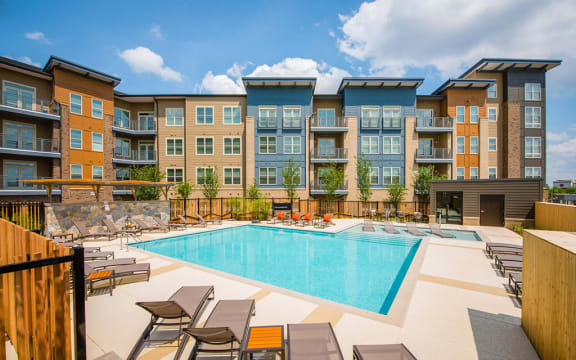 Relaxing Pool Area With Sundeck at Mira Upper Rock, Rockville, MD