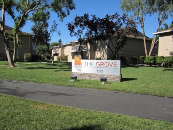 Entry Sign l The Grove Apartments in Davis CA