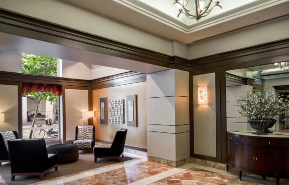 The Metropolitan's elegant lobby, with comfortable seating and marble flooring in Bethesda, Maryland.