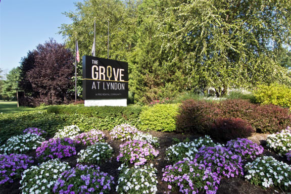 Entrance sign at The Grove at Lyndon Apartments in Louisville KY