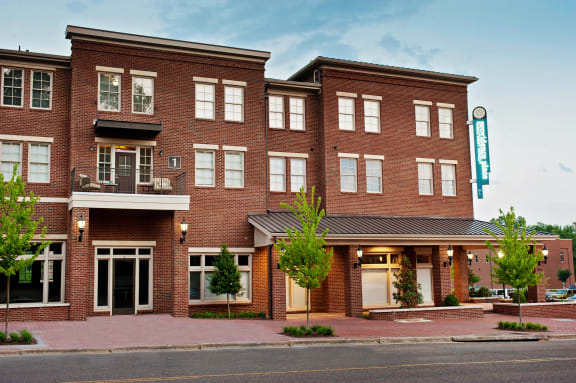 Exterior of Providence Place Apartments, modern large brick building