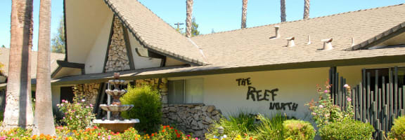 Property Sign at Reef Apartments, Fresno