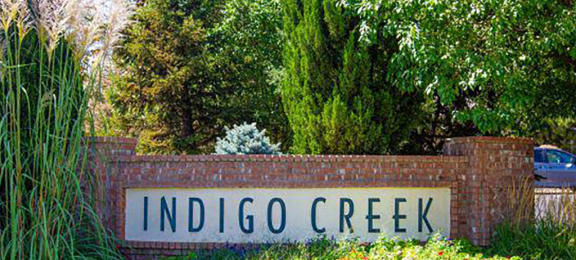 Welcoming Property Sign at Indigo Creek Apartments, Colorado