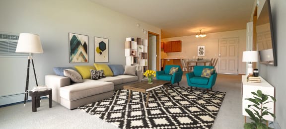 Furnished Living Room with Rug, Couches and Wall Art