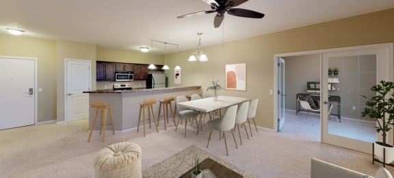 Full Kitchen with Breakfast Bar and Open Dining Room with Dining Table