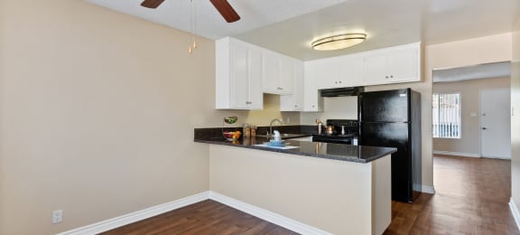 Kitchen and dining area at Terramonte Apartment Homes