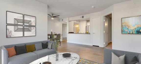 a living room with couches and a table