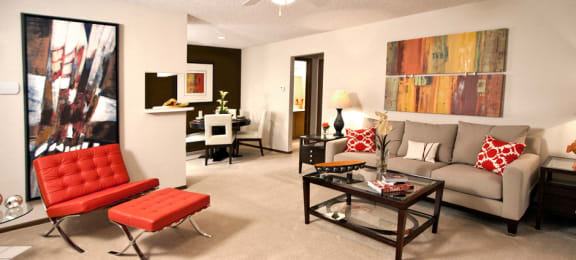 Spacious apartments with colored feature wall, breakfast bar, spacious dining room, and spacious living room at The Vanderbilt Apartments in Omaha, Nebraska