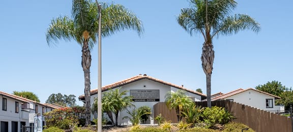 Entry leasing office building with sign