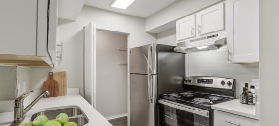 the timbers raleigh nc apartments for rent kitchen with stainless steel appliances and white cabinets with stone counter tops and pantry