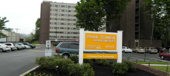Monument Signage with View of  Park Tower.