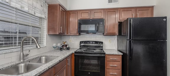 Kitchen with cabinets and Appliances at Normandy Club, Ohio