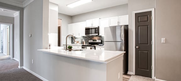 Chef-Inspired Kitchens Feature Stainless Steel Appliances, at Preserve at Mill Creek, Buford, GA 30519