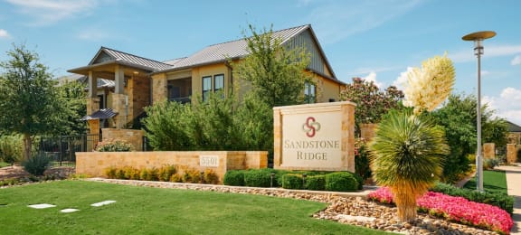 sandstone ridge apartments sign