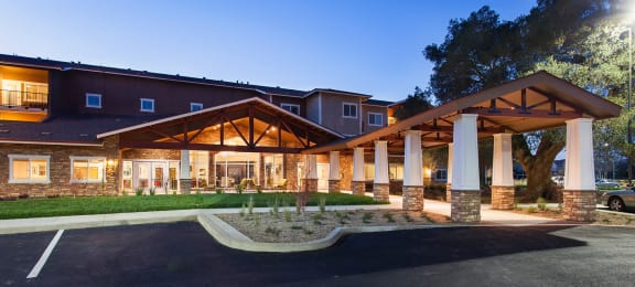 Exterior Entrance at Dusk at The Lodge at Morgan Hills Apartments in Morgan Hill CA