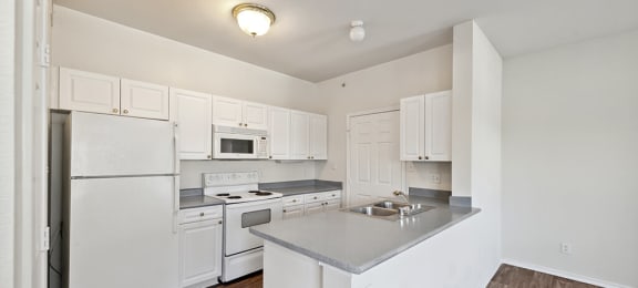 Vacant Kitchen 2 at Tivoli apartments in Dallas TX