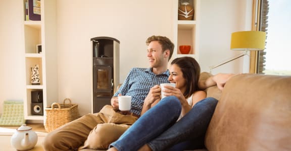stock image- young couple on couch