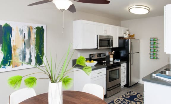 Kitchen and dining area| Stoneridge Luxury Apartments in Walnut Creek, CA