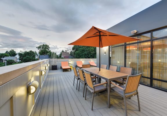 Rooftop Terrace with seating and dining space at Windsor at Maxwells Green, Somerville, MA