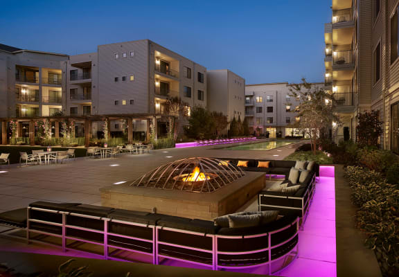 Outdoor Lounge Area With Fireplace at AVE Union, Union, New Jersey