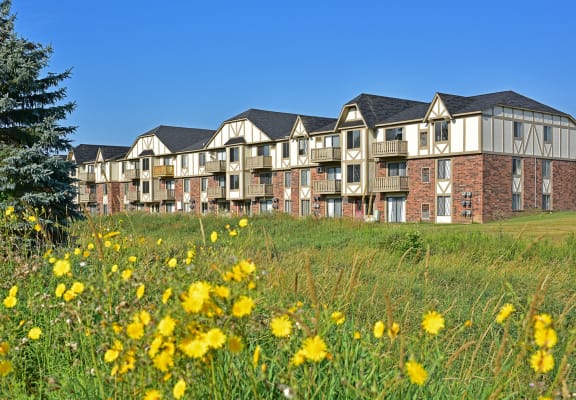 Lush Green Outdoor Spaces at Perry Place Apartments, Michigan