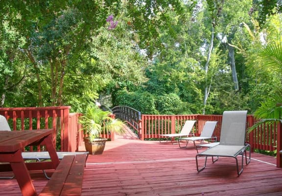 Sun deck with sitting area, at Cambridge Court Apartments, Nacogdoches, TX