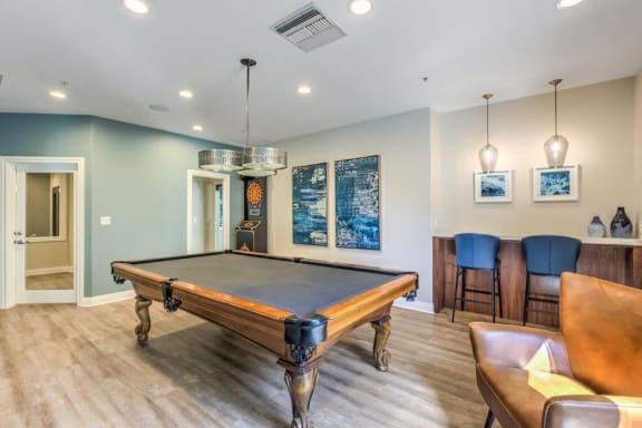 Thumbnail 24 of 37 - Riverside, CA Apartments for Rent -Stone Canyon Apartments Clubhouse with Billiards Table and Darts