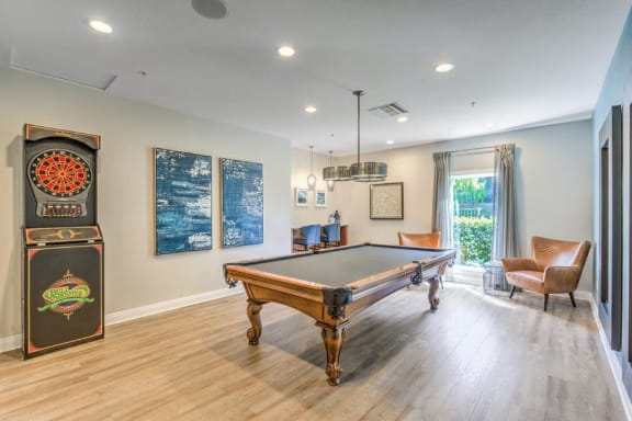 Thumbnail 23 of 37 - Riverside, CA Apartments for Rent -Stone Canyon Apartments Clubhouse with Billiards Table and Darts