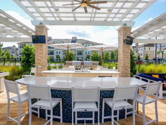 Thumbnail 8 of 39 - Outdoor Lounge at Oasis Shingle Creek in Kissimmee, FL