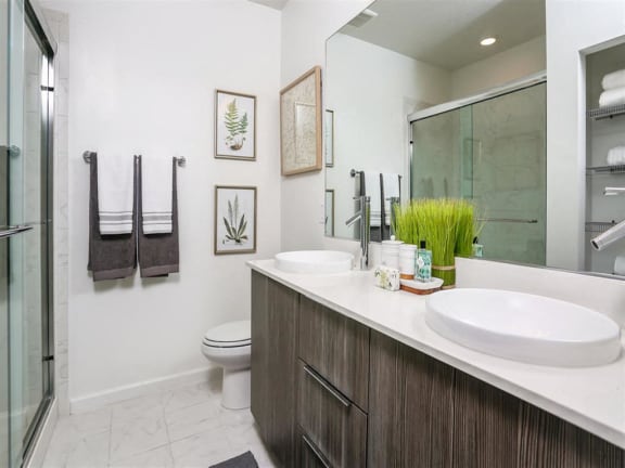 Thumbnail 21 of 39 - Double bowl raised vessel sinks in Master Baths at Oasis Shingle Creek in Kissimmee, FL