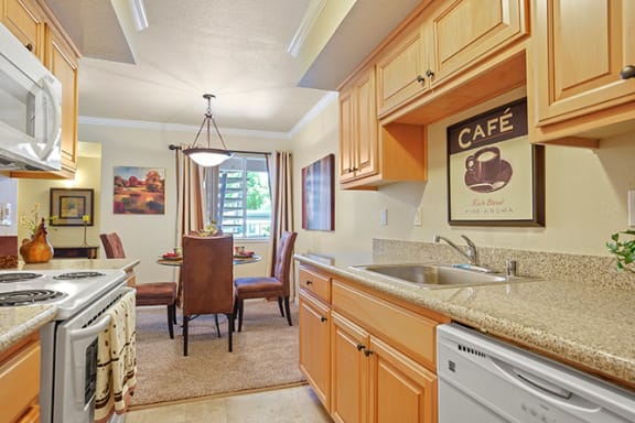 Well Equipped Kitchen And Dining Well Equipped Kitchen And Dining at Clayton Creek Apartments, California