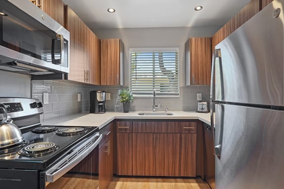 Refrigerator And Kitchen Appliances Refrigerator And Kitchen Appliances at Colonial Garden Apartments, California