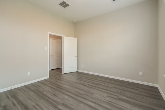 Wood Flooring in Bedroom Wood Flooring in Bedroom at Pradera Oaks, Texas