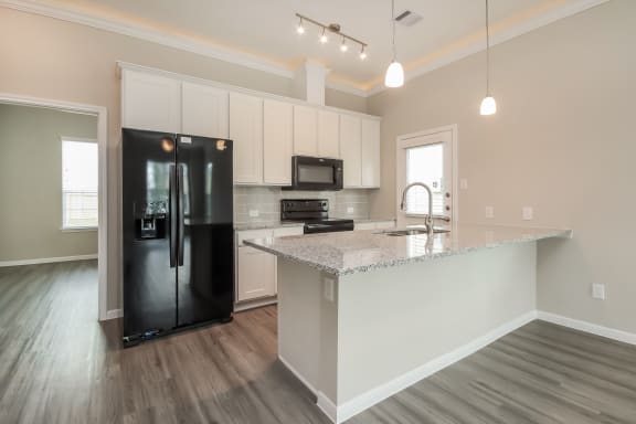 Granite Countertops in Modern Kitchen Granite Countertops in Modern Kitchen at Pradera Oaks, Bonney, Texas