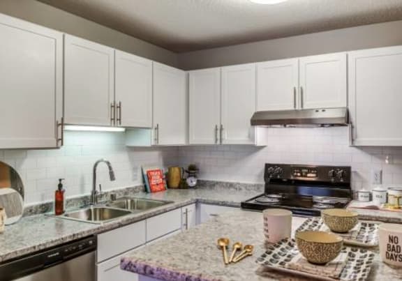 Open Kitchen With Wrap-Around Counters at Audenn Apartments, Minnesota, 55438