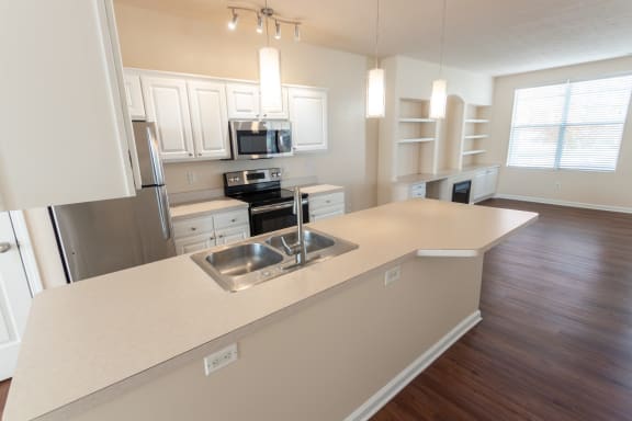 This is a photo of the kitchen in the 1498 square foot, 2 bedroom, 2 and a half bath Schooner floor plan at Nantucket Apartments in Loveland, OH.