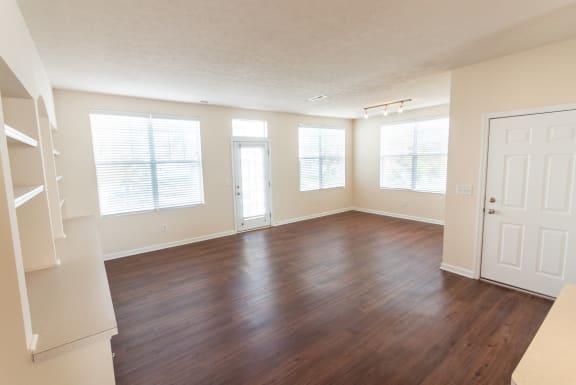 This is a photo of the living room in the 1498 square foot, 2 bedroom, 2 and a half bath Schooner floor plan at Nantucket Apartments in Loveland, OH.