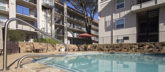 This is a photo of the pool area at Princeton Court Apartments in Dallas, TX.